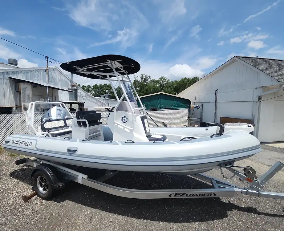 2026 Highfield Sport 560 Rigid Inflatable RIB Boat with Honda 115 4-stroke engine & 2026 EZ Loader aluminum single-axle trailer
